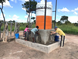 Children Drawing clean water from the tap_.jpg