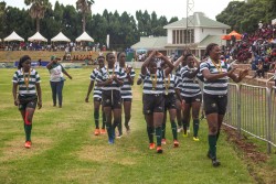 Lady Cheetahs celebrate winnning the Kwese Sevens title in Harare.jpg