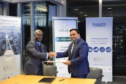 The African Guarantee Fund CEO Mr. Felix A Bikpo shakes hands with his GuarantCo.jpg