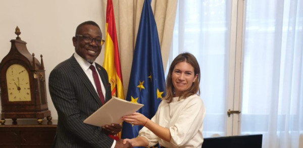 H.E Richard A. Opembe, Ambassador-Designate Presents an Open Copy of His Credentials