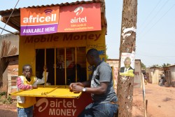 mobile-money-transaction-at-agents-office-in-uganda_24619737710_o.jpg