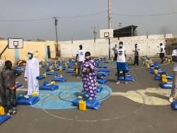IMG-COVID RELIEF PACKAGES WITH SEED TEAM AT BASKET BALL COURT IN SAINT LOUIS SENEGAL.jpg