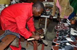 Micheal-Habumugisha--of-Musanze--in-his-workshopmaking-leather-products- (2).jpg