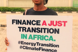 Protestor advocating for financing for just transition in Africa (002).jpg