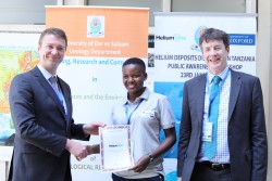 Helium One’s Chief Executive Officer, Thomas Abraham-James hands a sponsorship certificate for a fun