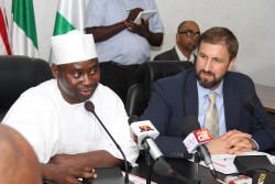 NEMA DG Muhammad Sani Sidi (L) responds to the announcement by the USAID Director of Foreign Disaste
