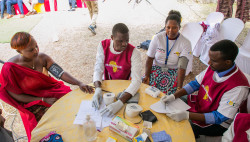Members-of-the-community-screening-for-elevated-blood-pressure-in-Rwanda.jpg