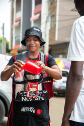Ahou, a female coffee seller in Côte d'Ivoire.jpg