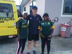 SASC Stuart Aimer, S&C Coach of London Scottish FC, with two of the Ghana Rugby women players in Acc