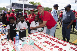 Commerating 10 years of Delivering Happiness to Diepsloot with a cake.jpg