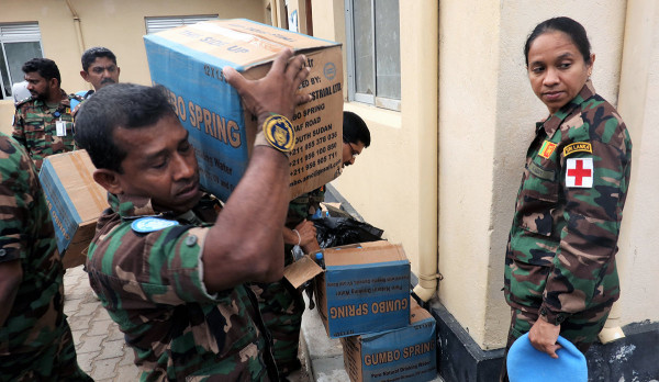 Sri Lankan peacekeepers share time, meals and other gifts with patients at Bor hospital (Gideon Sackitey)