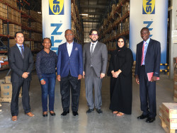 Mineral Circles Bearings' Michel Peltier (1st from left) and Hassanein Alwan (4th from left) with Du