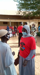 IMG-SEED COVID PKGWOMAN STAFF AND BENEFICIARY.jpg